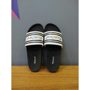 SLIDE RIP CURL BRANCO COM O SOLADO PRETO